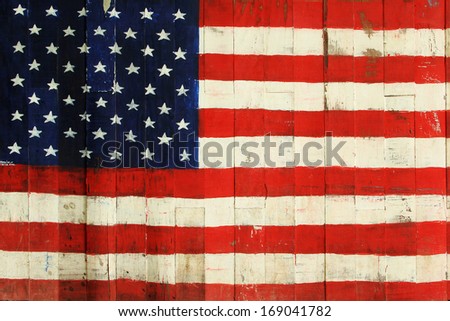 The USA flag painted on wooden wall