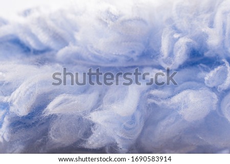 Macro detail of the pink fibers of a textile garment. Royalty-Free Stock Photo #1690583914