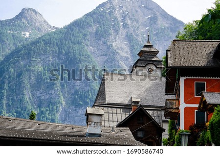 Scenic picture-postcard view of famous Hallstatt mountain village in the Austrian Alps at beautiful light in summer, Salzkammergut region, Hallstatt, Austria