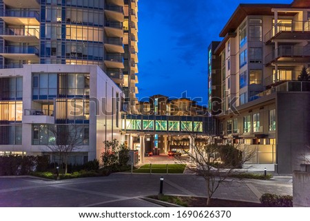 Fantastic night view at modern apartment or office buildings in Vancouver, Canada.