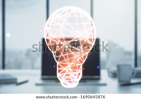 Double exposure of creative light bulb hologram on laptop background, research and development concept