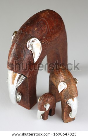 Wooden Elephant carvings with silver.
