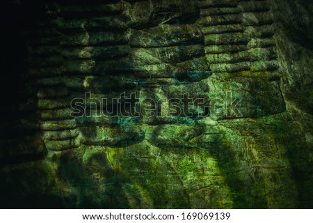 Mysterious stone wall background Royalty-Free Stock Photo #169069139