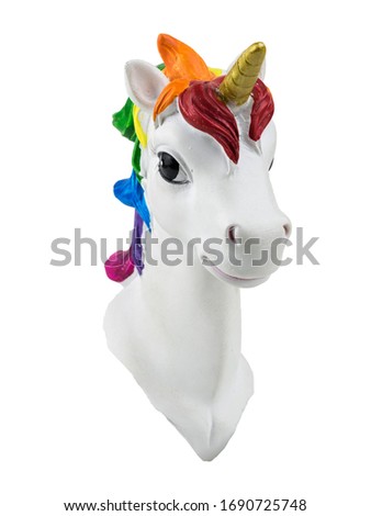 The head of a unicorn with a multicolored mane isolated on a white background. Trend. Minimalism. Lifestyle.