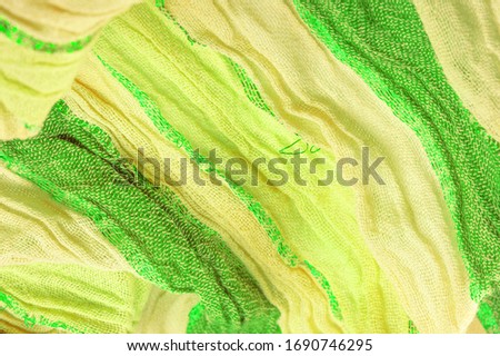 Background texture pattern, ornament, background, silk fabric, large strips of yellow green, separated by a strip of emerald gold, this fabric will decorate your design, you will be the best