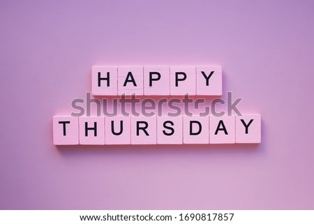 Happy thursday words wooden cubes on a pink background. Royalty-Free Stock Photo #1690817857
