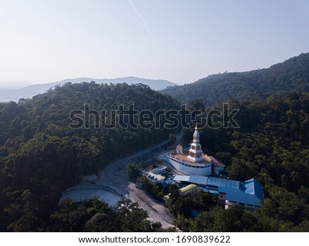 A beautiful Buddhist temple located in beautiful hills at sunrise