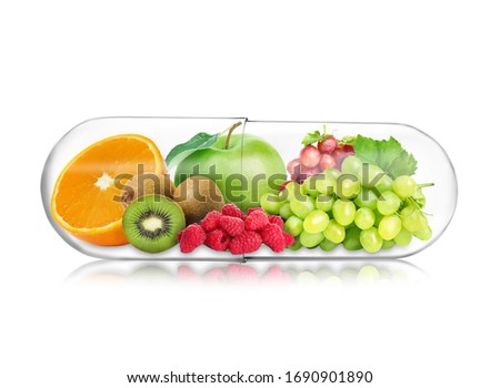Transparent capsule with different fruits and berries rich in vitamins on white background Royalty-Free Stock Photo #1690901890