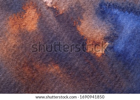 Abstract art background navy blue and orange colors. Watercolor painting on canvas with brown stains and gradient. Fragment of artwork on paper with pattern. Texture backdrop, macro.