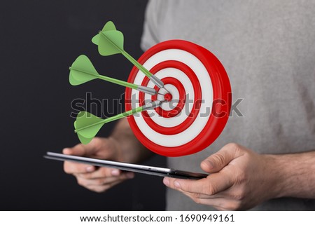 dart target arrow hitting on bullseye which is the ultimate goal that everyone wants
