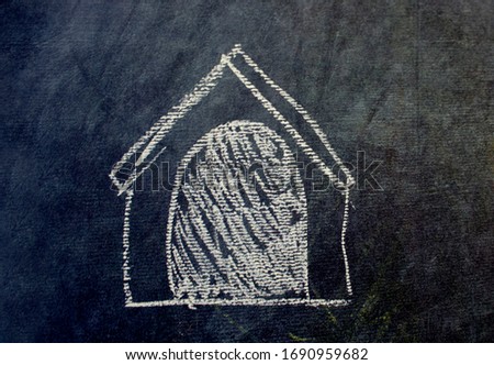 Dog’s house chalk drawing on blackboard