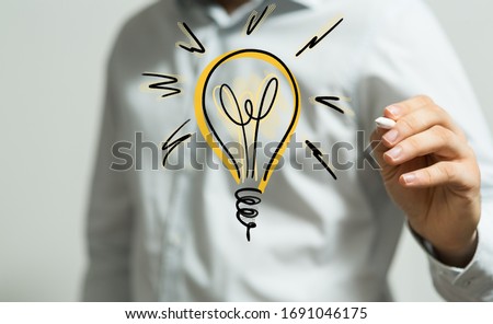 idea lamp concept in hand
 Royalty-Free Stock Photo #1691046175