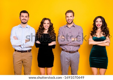 Portrait of attractive two fancy ladies macho guys four company students couples graduation party photo set well-dressed arms crossed cheerful best friends isolated yellow color background