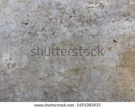 Texture of aged gray cement wall for background.