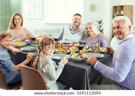 Family celebrating Thanksgiving Day at home