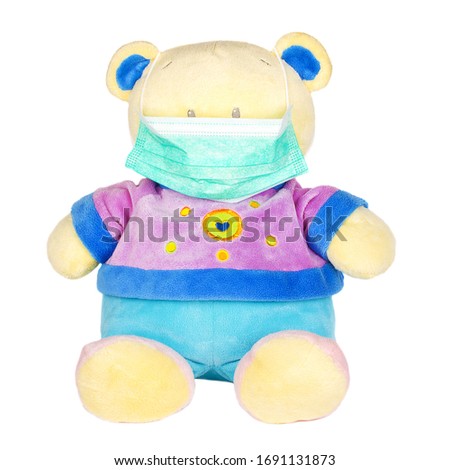 soft toy in a medical mask