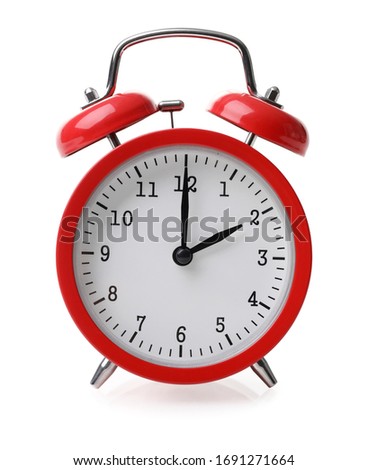 Red alarm clock set at two isolated over white background close-up with clipping path