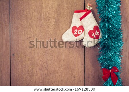 New Year date decoration on wooden wall background