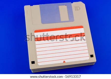 Floppy disks isolated on blue background
