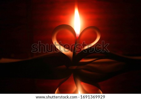 Love symbol with using book and candle