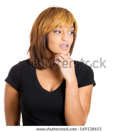 Closeup portrait of young woman thinking daydreaming deeply about something chin on hand looking away, isolated on white background. Human emotion facial expressions feelings