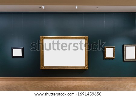 Several old rustic frames hanging on a woll in a exhibition Royalty-Free Stock Photo #1691459650