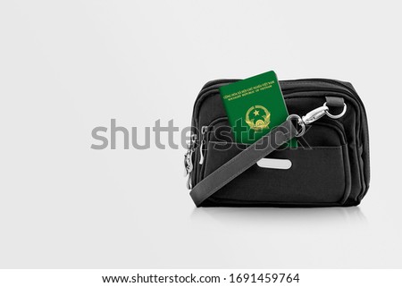 Vietnam Passport in Black Travel Bag Pocket with Copy Space on Isolated Background