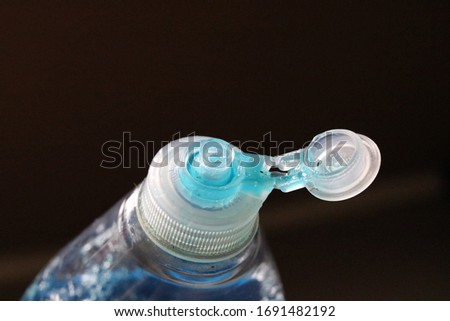 The top of a dish detergent bottle. Royalty-Free Stock Photo #1691482192