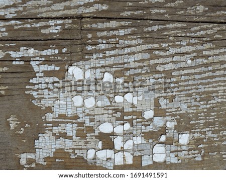background image of an old wooden wall with cracked white paint
