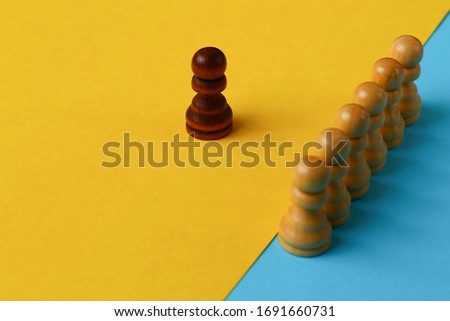 Abstract art concept of an ideological leader and organizer of management based on chess pawns Royalty-Free Stock Photo #1691660731