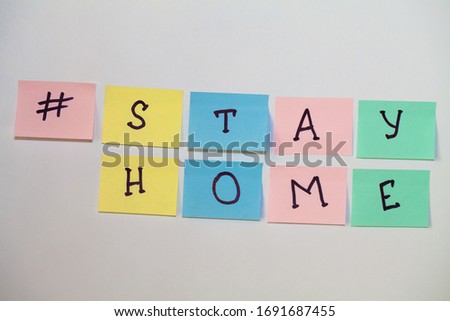 Sign to Stay At Home. Word Letter Advice with hashtag "Stay at home" to stop coronavirus COVID-19 spreading. Global pandemic Covid -19.