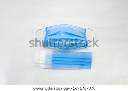 This 4 layer medical mask can protect the corona virus on a white background.