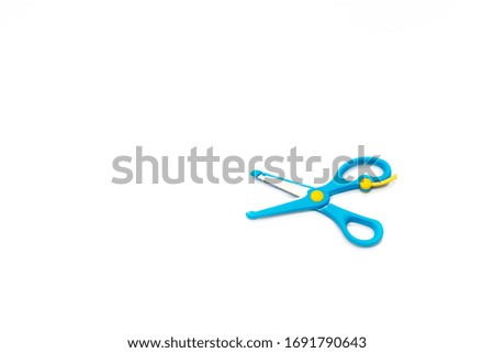 Colorful scissors. Scissors on the paper. 