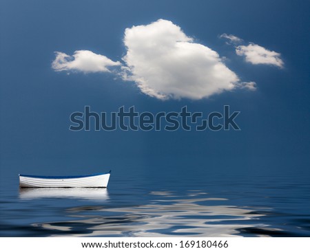 Concept image of loneliness, lacking direction, no leadership, rudderless, floating, listless or generally adrift without a goal Royalty-Free Stock Photo #169180466