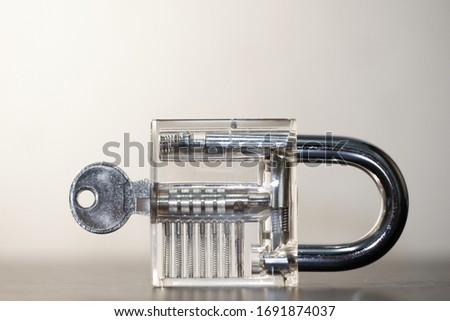 Clear padlock with visible details