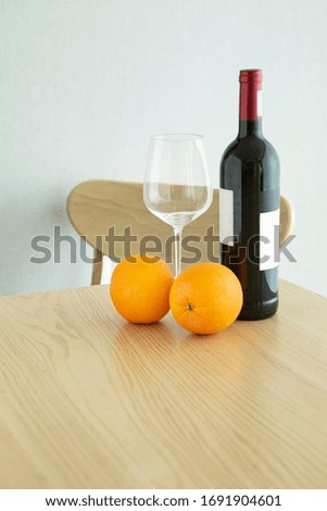organic orange wineglass wine on the table