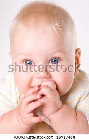 Bright picture of little baby boy isolated on white