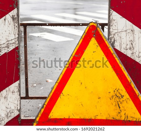 Triangle warning sign. Basic warning sign triangle with a red border and amber background.