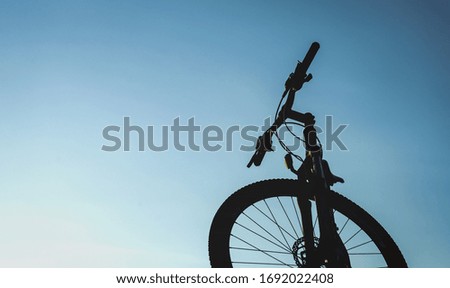 Ckise up shot of a bicycle against clear blue sky. 