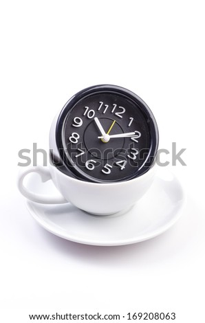 White cup and clock on isolated white background