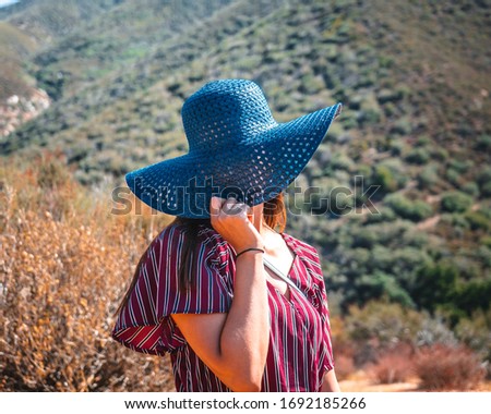 Caucasian Women Hiding Face  in Lancaster California  Landscape Portrait picture  Colors - mountains  nature Beauty 