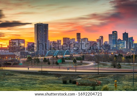 Denver, Colorado, USA downtown city skyline at dawn. 