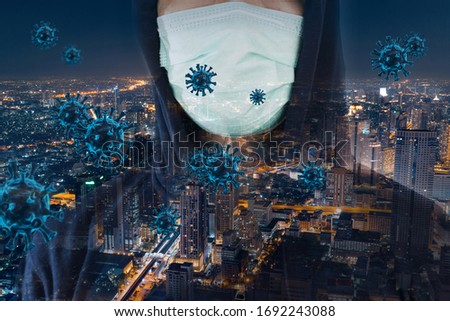 Double exposure of man wearing a mask with a bird's eye view of the city at night with 3d model of coronavirus covid-19. Concept of the spread of virus and medical illustration.