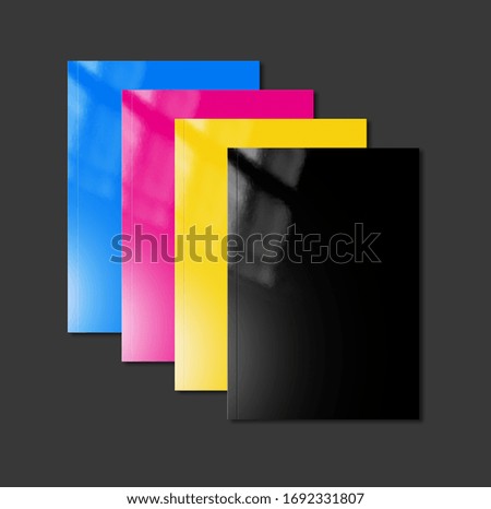 CMYK booklet covers set isolated on black background - mockup illustration
