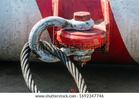 Shackle and sling pre-slung to a riser guard Royalty-Free Stock Photo #1692347746