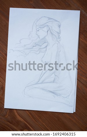 Sketches, sketching on white paper with a simple pencil. Colour pencils.