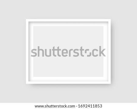 Rectangular wall picture ot photo frame mockup isolated on light background. Banner or poster template, decorative design element. Realistic vector illustration. Royalty-Free Stock Photo #1692411853