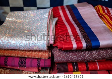 Close-up on beautiful vintage "obi"/"sash". Stylish, second hand asian accessories. Royalty-Free Stock Photo #1692418621