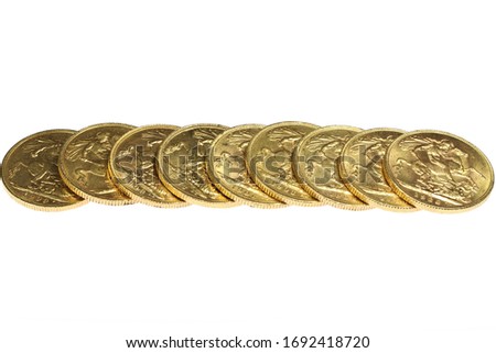 British full Sovereign gold coins isolated on white background Royalty-Free Stock Photo #1692418720