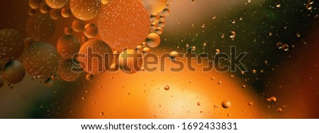 oil with bubbles on a colorful background. Abstract blured background. Soft selective focus.
